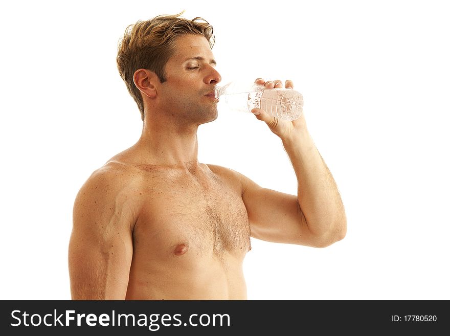 Young man drinking bottled water