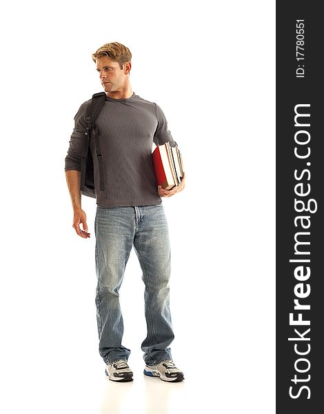 Young man with books and backpack