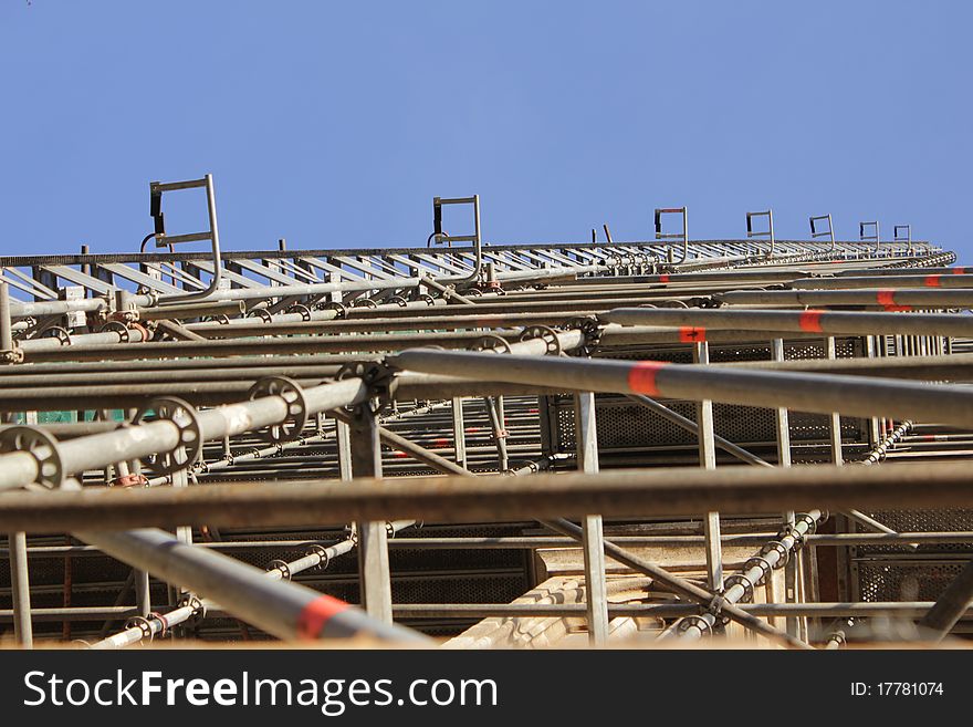 An building restauration with a giant scaffold. An building restauration with a giant scaffold