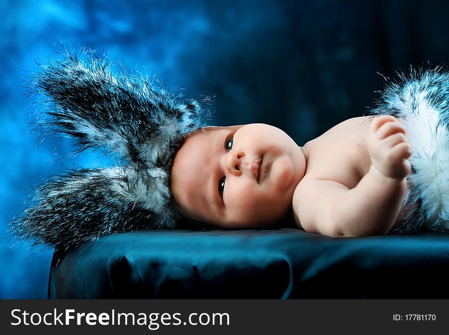 Portrait of a beautiful baby in rabbit costume.