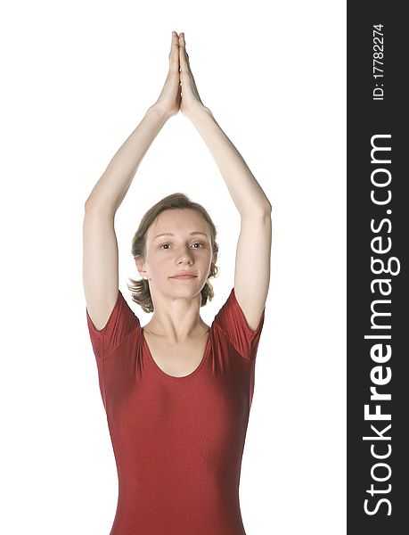 Woman in a red leotard exercising over white background. Woman in a red leotard exercising over white background