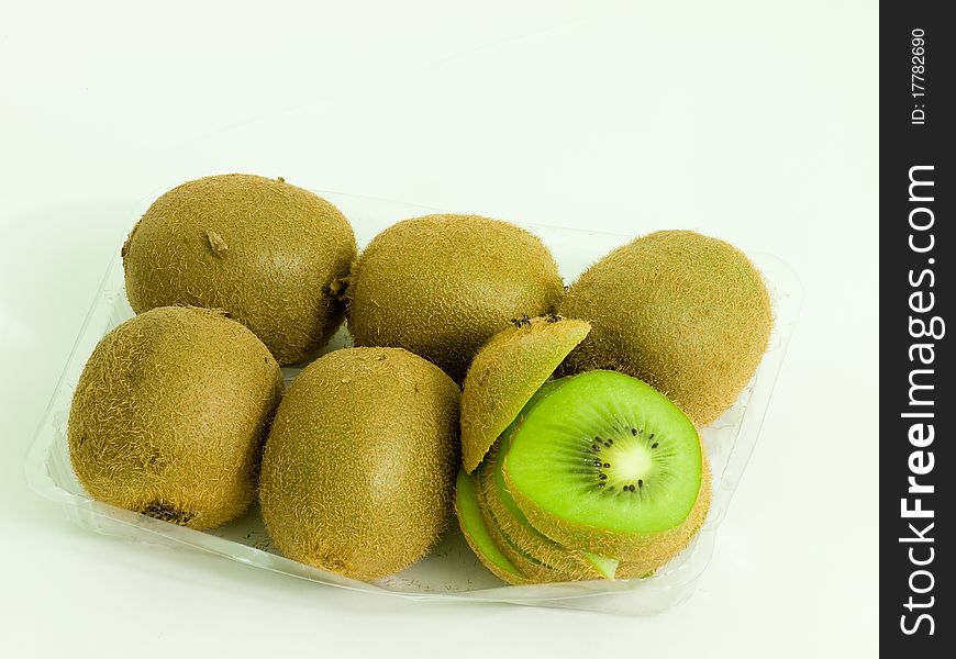 sliced Kiwi fruit in plastic tray