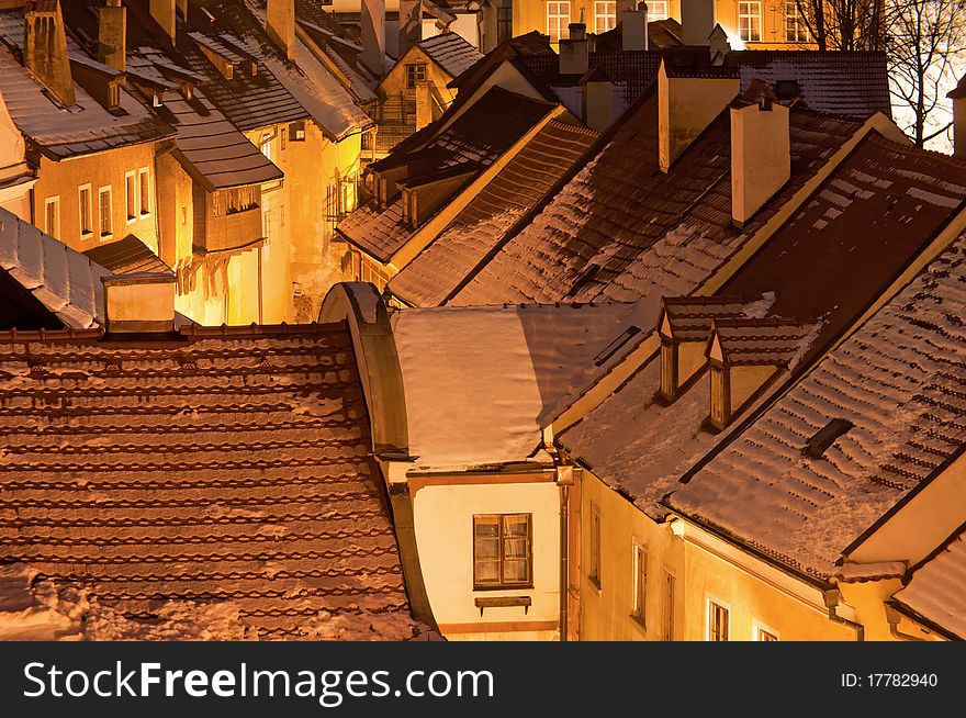 Historic houses in Cesky Krumlov during the nighttime.