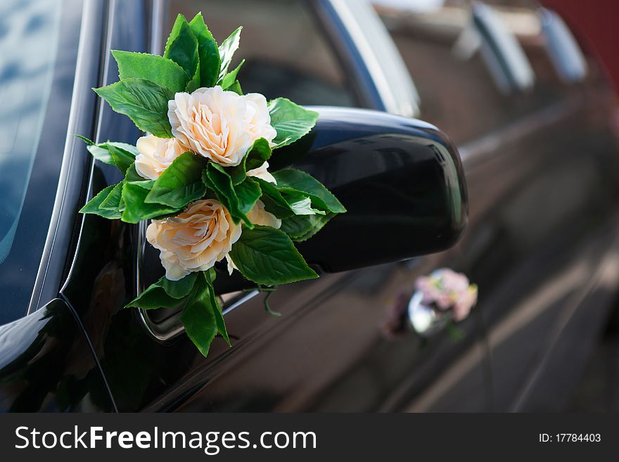Beautiful flower decoration on mirror of the car