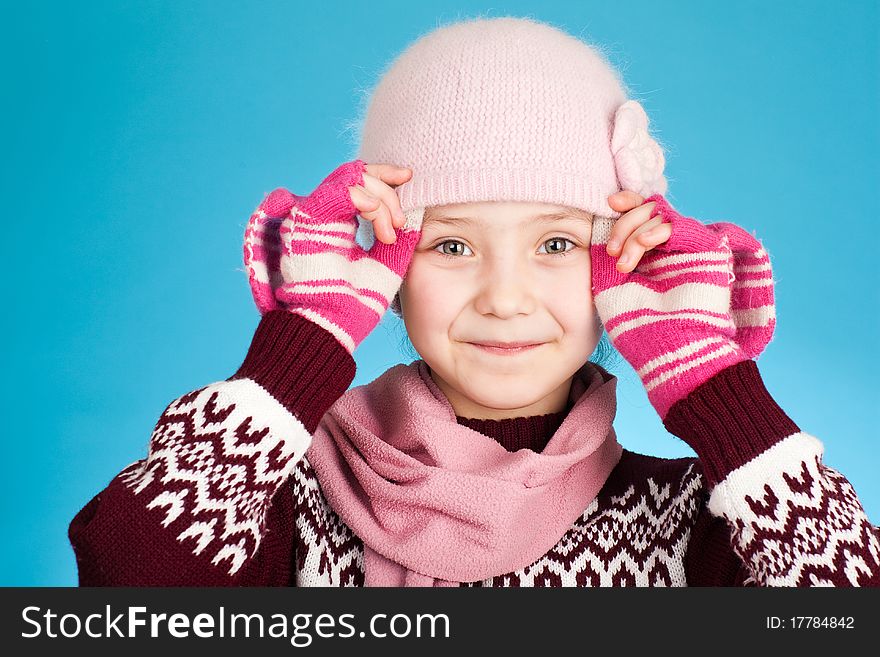 Little girl on blue background