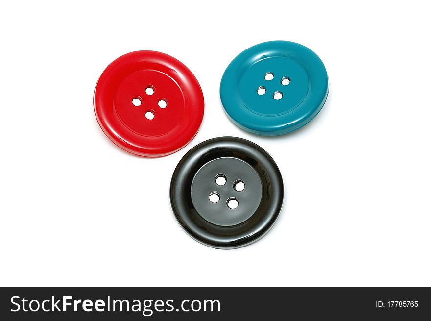 Three colored buttons isolated over white background