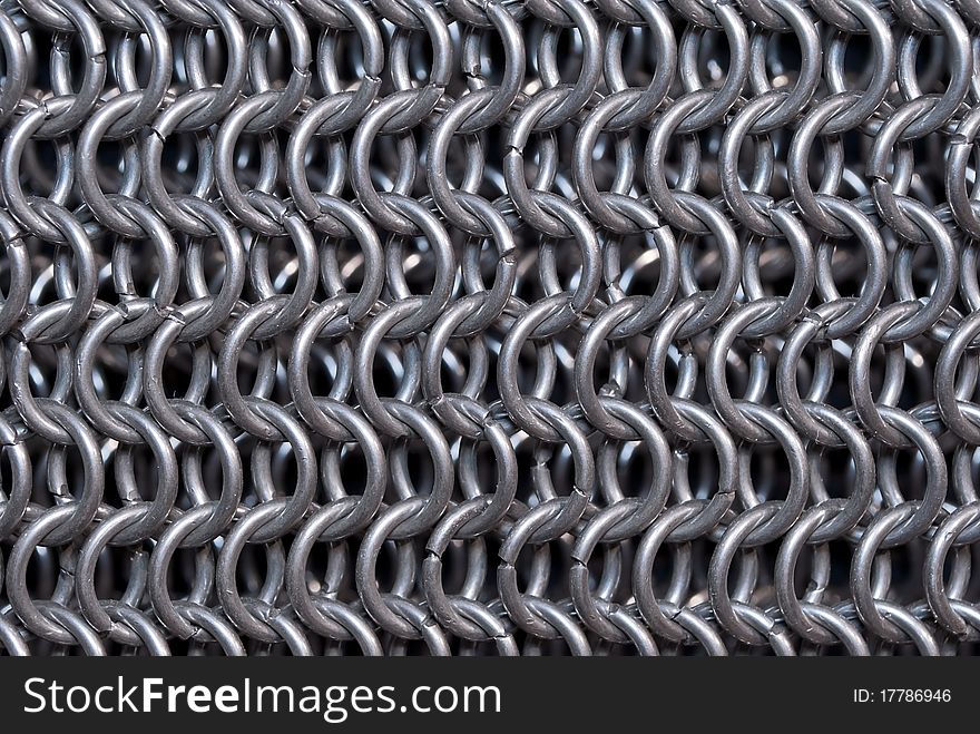 Rows of chain mail rings as a texture. Rows of chain mail rings as a texture