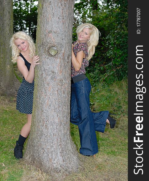 Image showing two pretty blonde females outdoors. Image showing two pretty blonde females outdoors