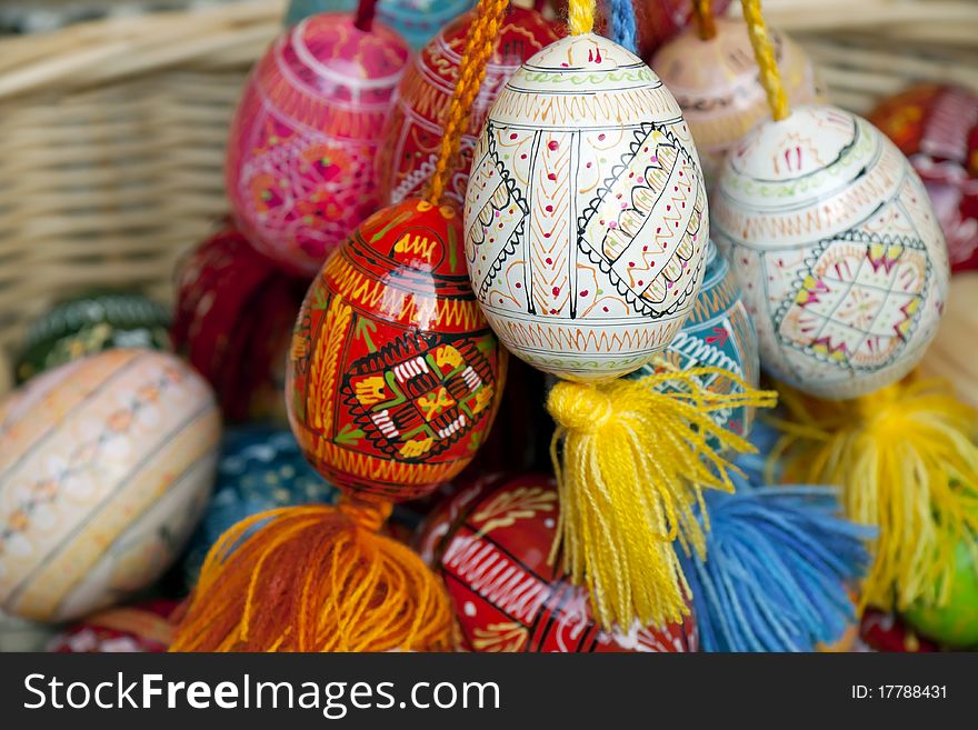 Wattled basket with multi-coloured Easter eggs. Wattled basket with multi-coloured Easter eggs