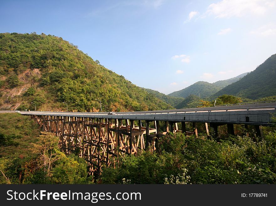 This bridge is wooden stilt across the valley at length and the largest in Thailand. This bridge is wooden stilt across the valley at length and the largest in Thailand