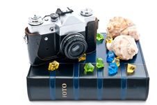 Camera And Photo Album Royalty Free Stock Photos