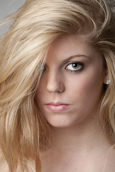Intense Close-up Of Pretty Blonde Girl Royalty Free Stock Image