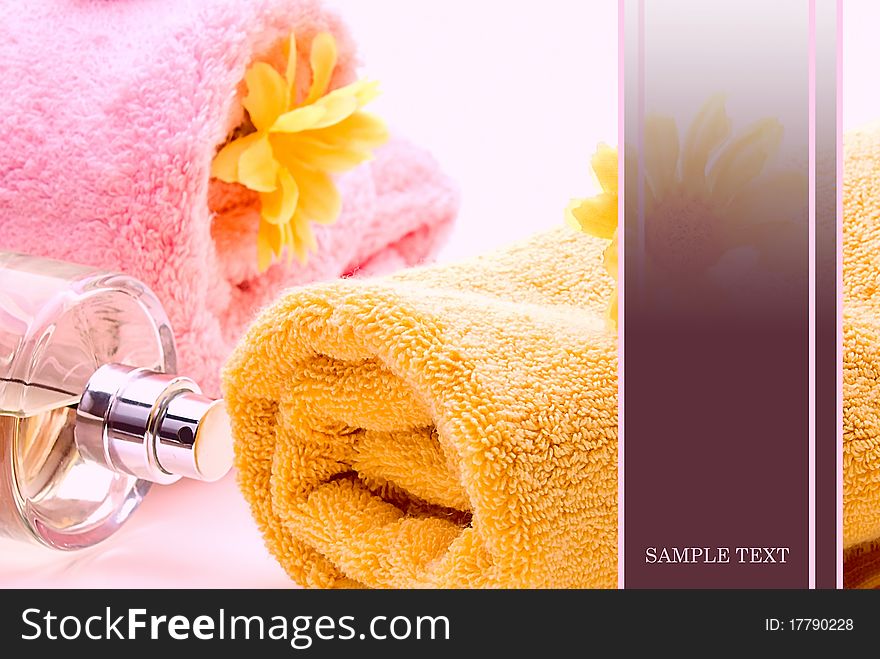 Spa composition of towel and flower