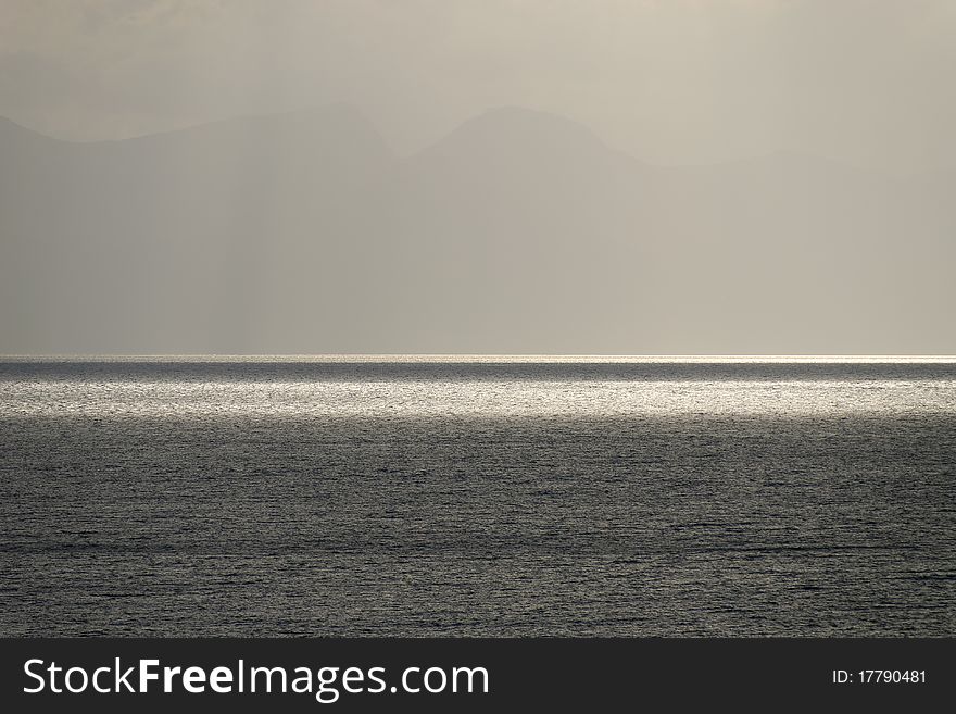 Strips of light on the sea of Genoa. Strips of light on the sea of Genoa