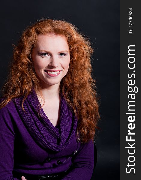 Portrait of charming  young woman on black. Portrait of charming  young woman on black