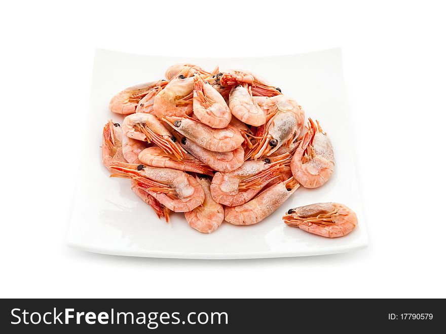 Tasty fried prawns on plate. Isolated on white
