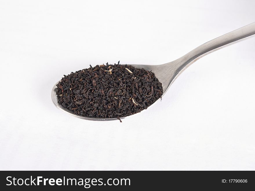 Tea spoon with some tea