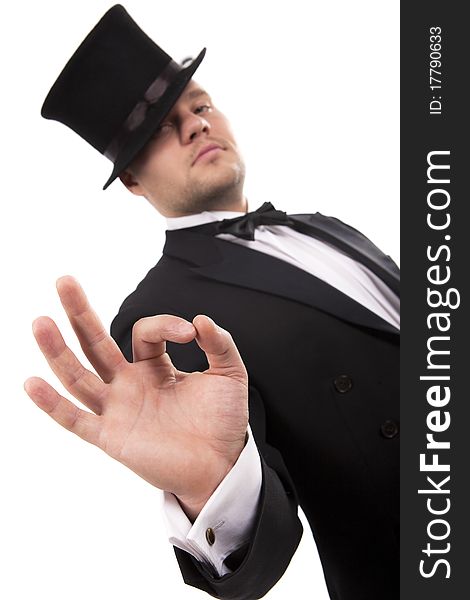 Man with top hat making 'ok' gesture. Man with top hat making 'ok' gesture