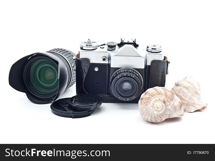 Black retro analog camera with lens. Isolated on white. Black retro analog camera with lens. Isolated on white