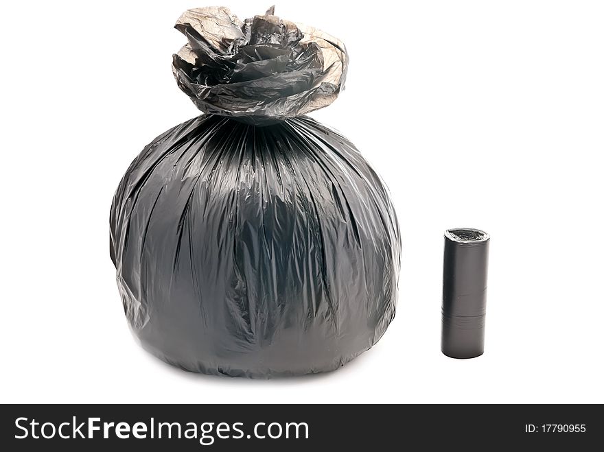 One black garbage bag isolated on white
