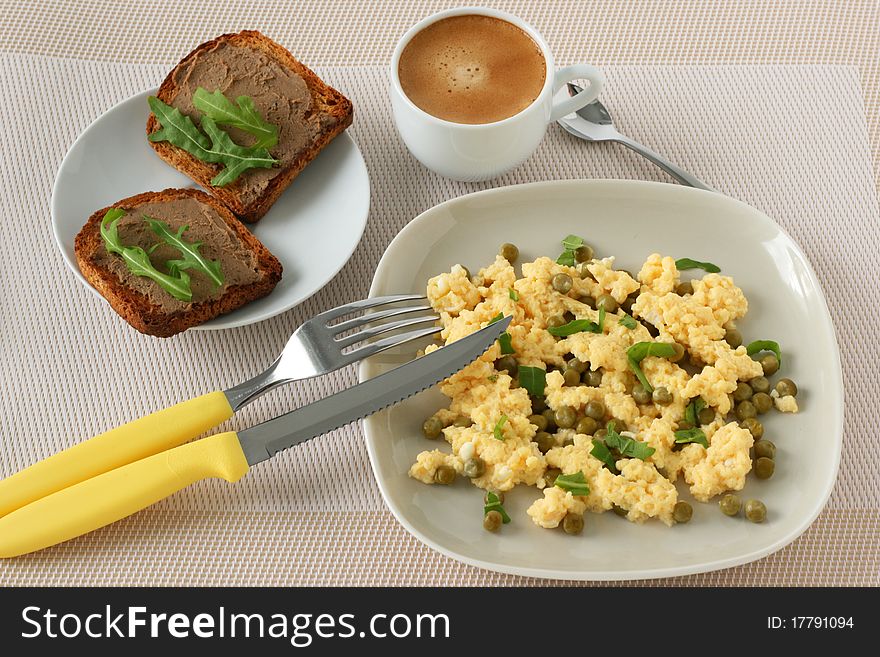 Omelet with toasts and a cup of coffee. Omelet with toasts and a cup of coffee