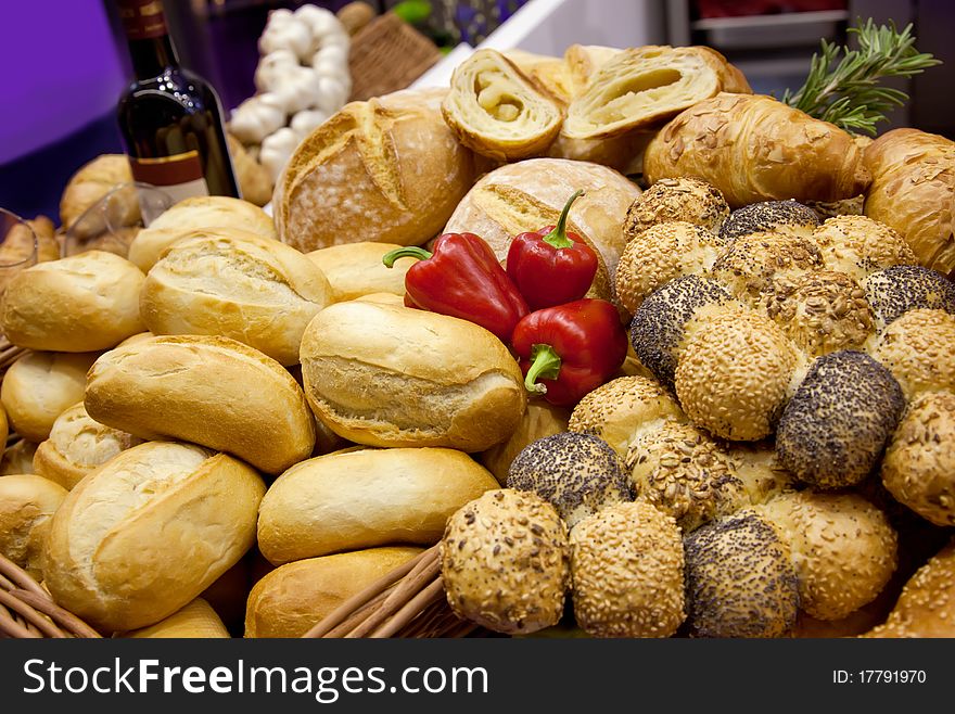 Bread background with wine bottle