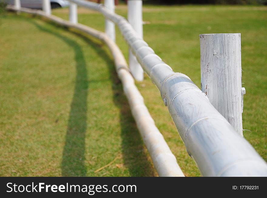 Low White Bamboo Fence in the Garden.