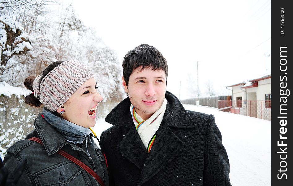 Young couple having fun outdoors in winter. Young couple having fun outdoors in winter