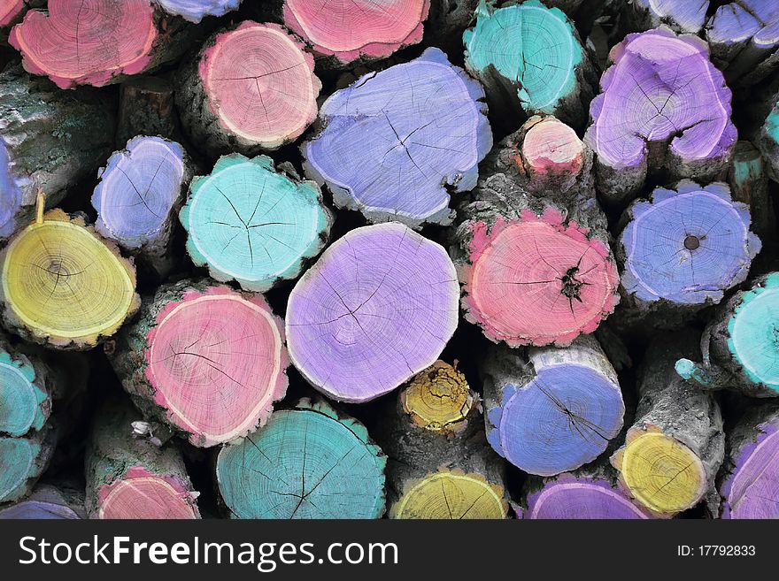 Fire wood. Multicolored woodstack background