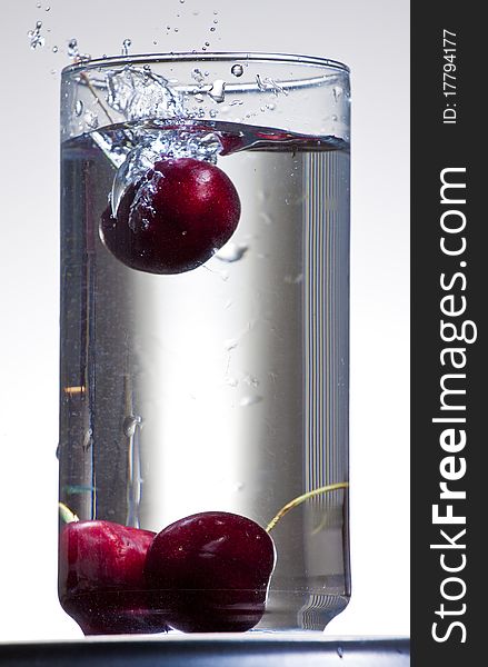 Cherries Dropping into Water