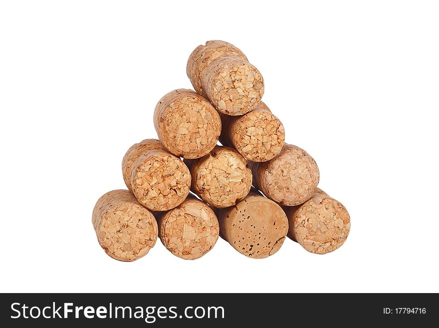 Wine cork lined pyramid on white background. Wine cork lined pyramid on white background