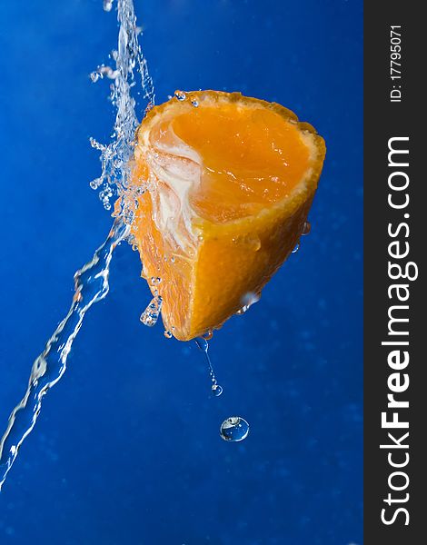 Water Splash On A Orange