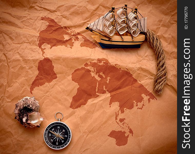 Compass, shell and model classic boat on grunge background. Compass, shell and model classic boat on grunge background