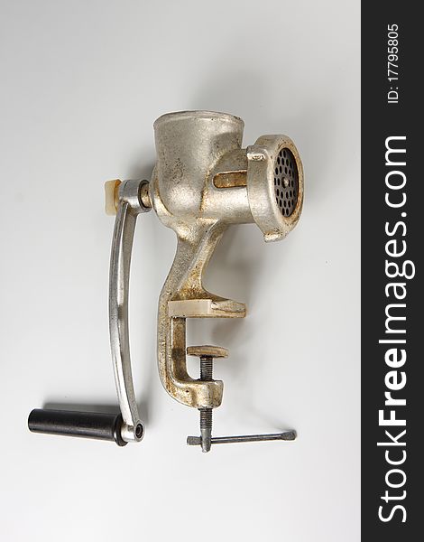 Meat grinder on a white background