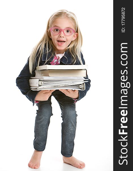 Cute little girl holding books isolated on white background