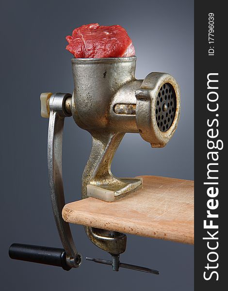 Meat grinder on a white background