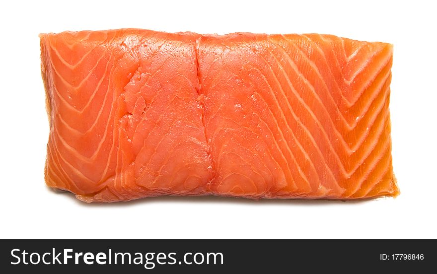 Fresh uncooked red fish fillet over white