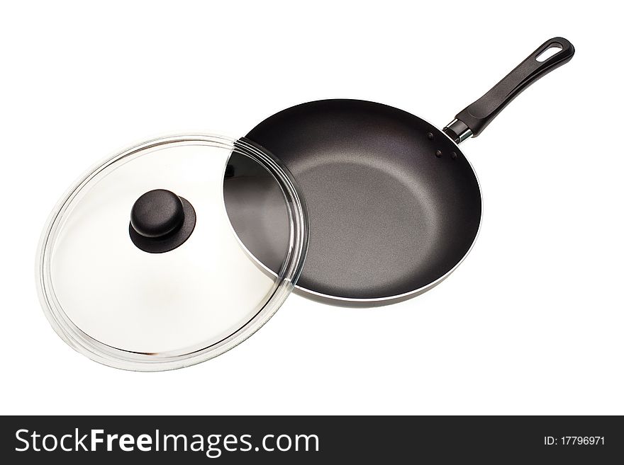 Frying pan with a glass cover it is isolated on a white background. Frying pan with a glass cover it is isolated on a white background