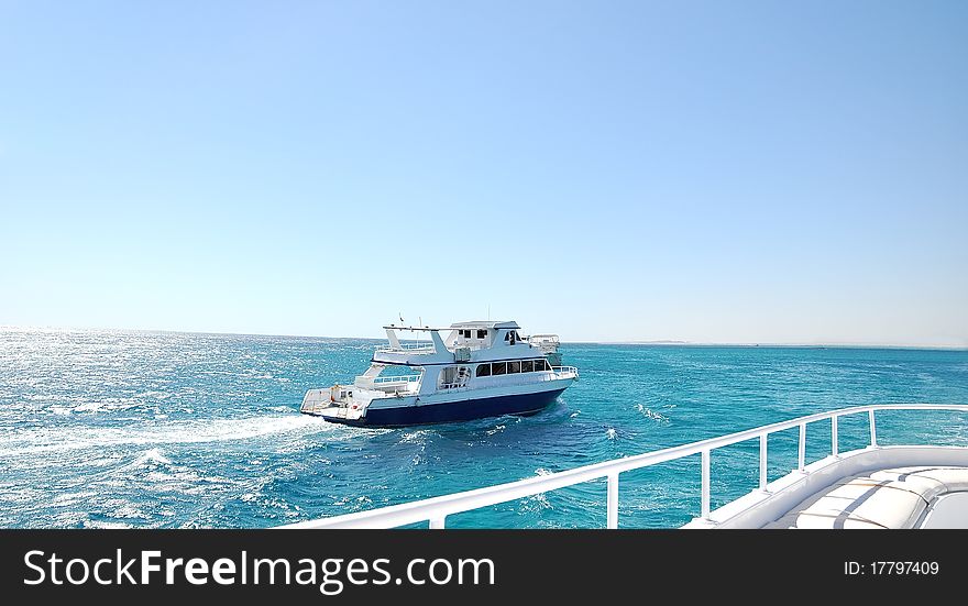 On a board of white luxury yacht in the sea