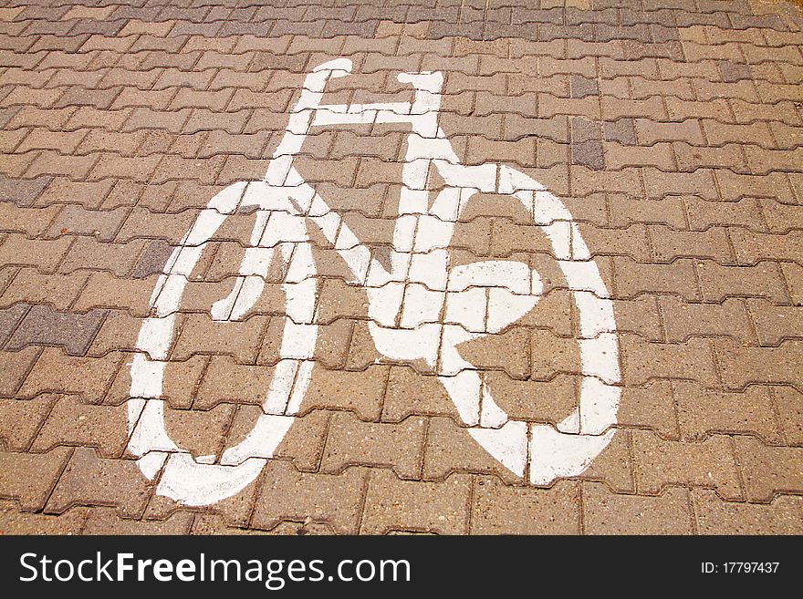 Bicycle symbol painted on pavement. Bicycle symbol painted on pavement