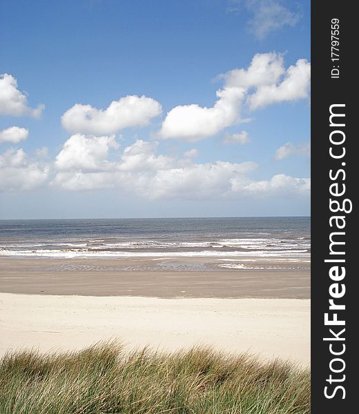 Beach with clouds and blue skie