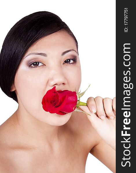 Portrait of a girl with a rose on a white background. Brunette. Portrait of a girl with a rose on a white background. Brunette.