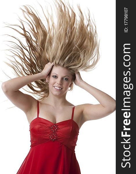 Beautiful blonde teenage girl with flying hair