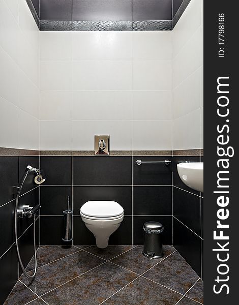 Interior of restroom in black and white colors. Interior of restroom in black and white colors