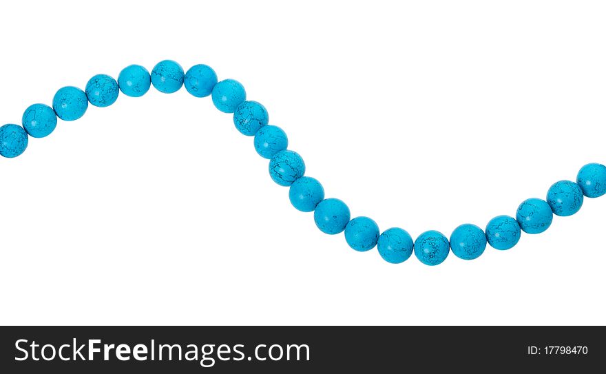 Close-up blue beads, isolated on white