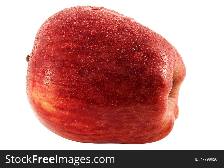 Red apple in the dew isolated on a white background