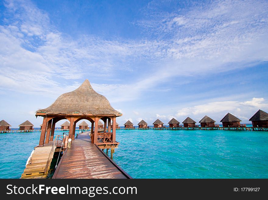 Pier on the tropical island of Maldives