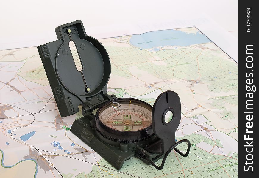 View of the compass on the background of map