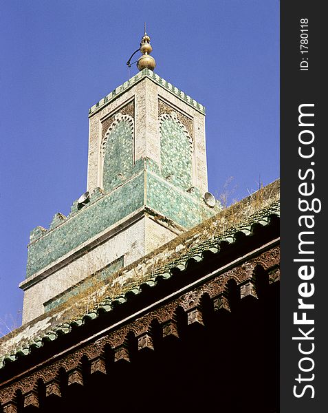 Minaret of the mosque of the religious university of Meknes, Morocco. Minaret of the mosque of the religious university of Meknes, Morocco.