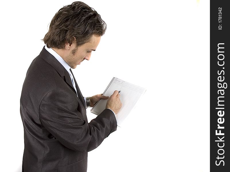 Businessman working and writing on his notepad